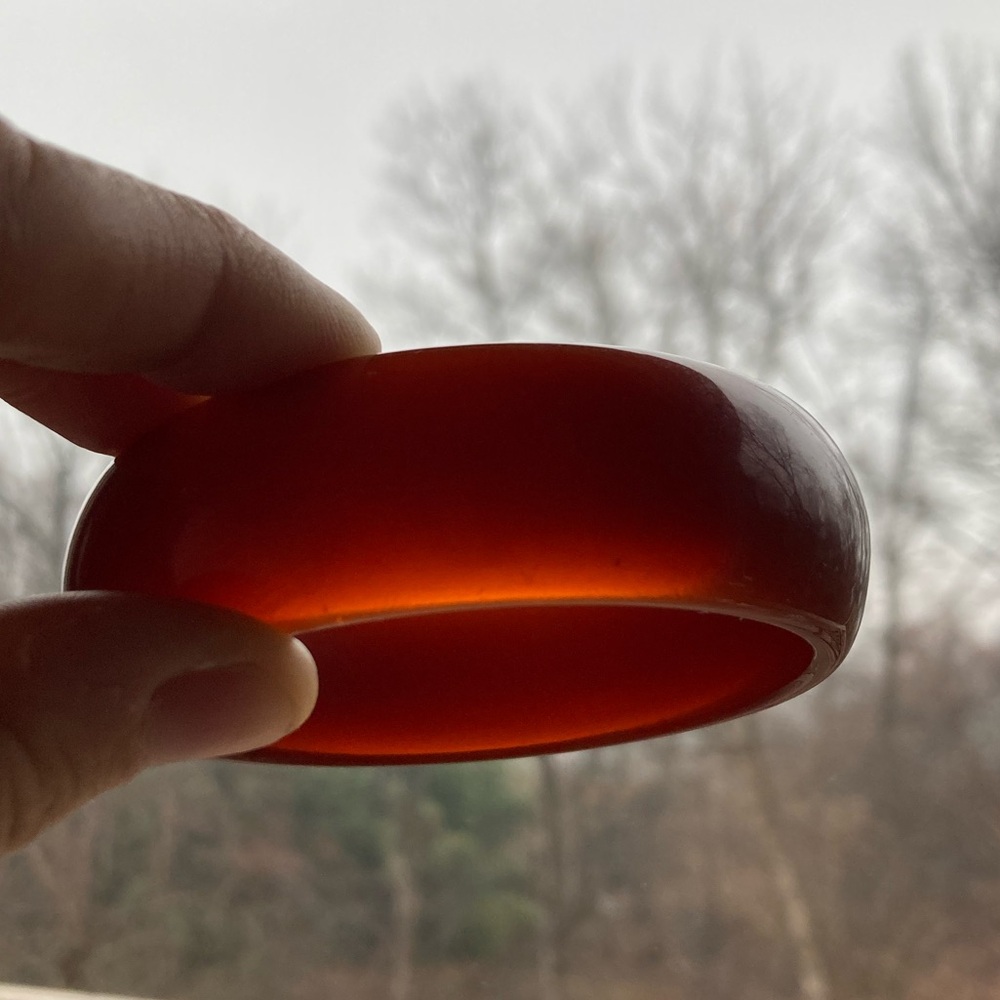 Burnt orange lucite bangle bracelet